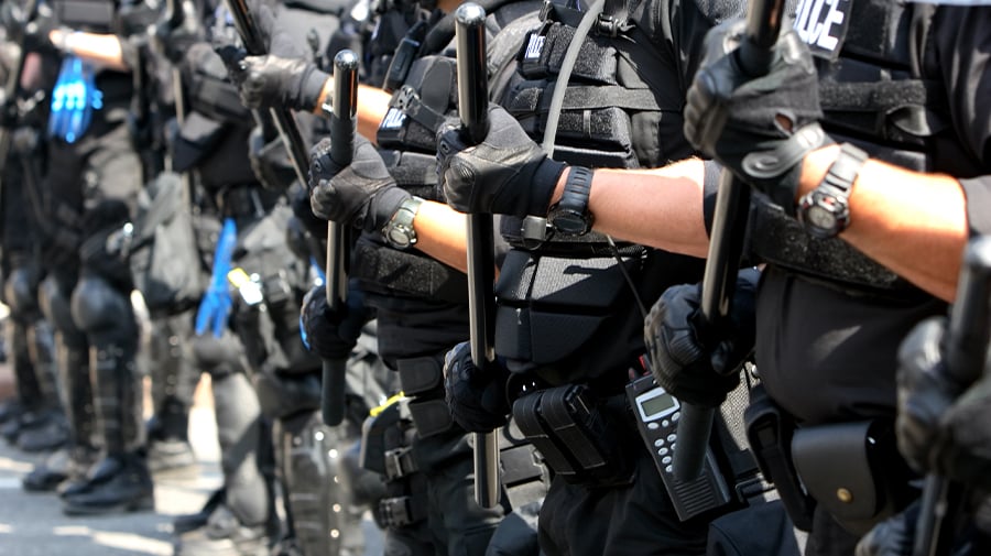 Strikes, Riots, and Civil Commotion 
    (SRCC) Risk Model - Police in riot gear